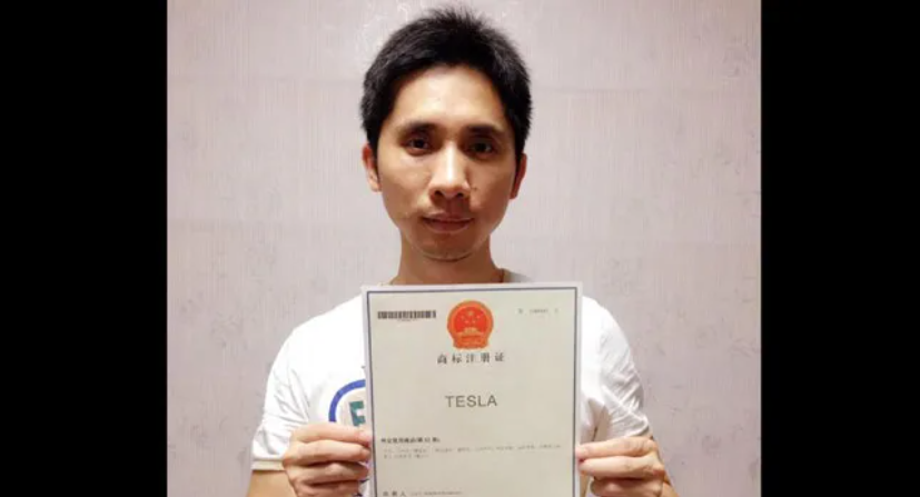 Zhan Baosheng with his patent on Tesla in China