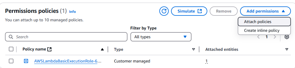 Clicking on 'attach policies' in the Lambda function